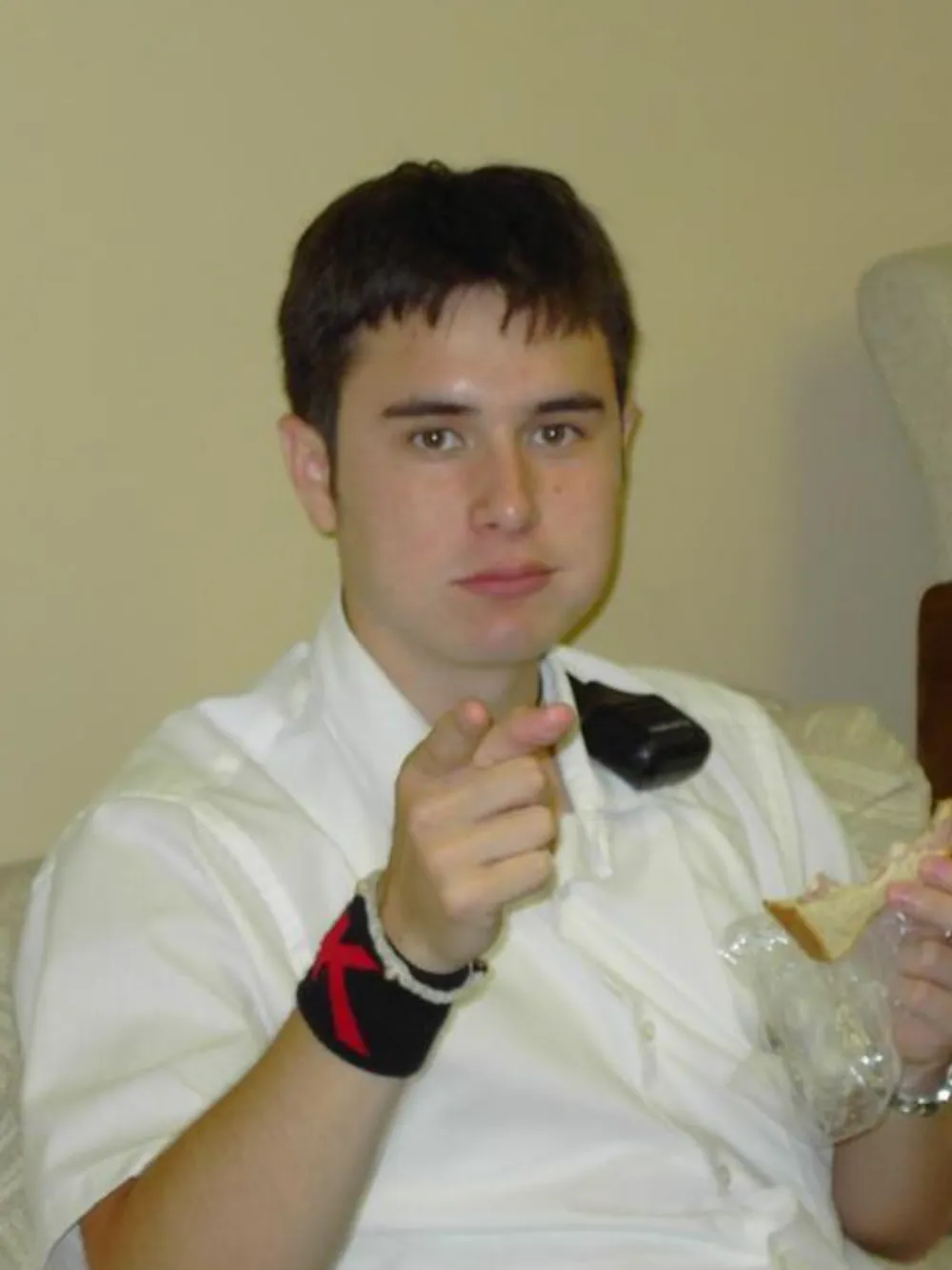 Pointer Pointer showing a real photo of a person pointing at the exact spot where the cursor was placed